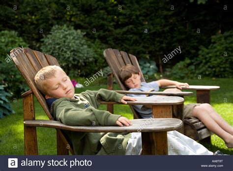 I can feel your eyes staring bb and verse 2 f dance with me in my backyard boy bb looking super fine in your corduroy f roll the. Young boys relaxing in backyard lawn chairs Stock Photo ...
