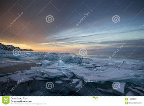 Lake Baikal At Sunset Everything Is Covered With Ice And Snow Stock
