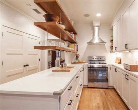 Near the prep sink and/or opposite the primary sink you may include a rack or pegs to hang dish towels and hand towels. 30+ Amazing Kitchen Cabinets Hanging From Ceiling For Your ...