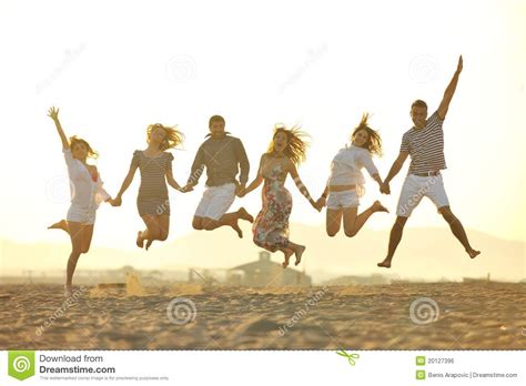 Happy Young People Group Have Fun On Beach Royalty Free