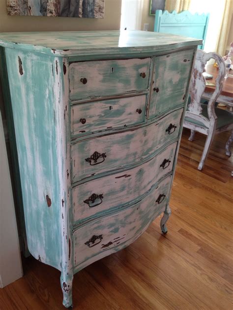 Rated 5 out of 5 stars. Antique chest of drawers ....turquoise, white, distressed ...
