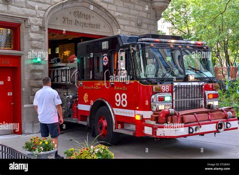 Fire Engine From The Chicago Fire Department With Firefighter Stock