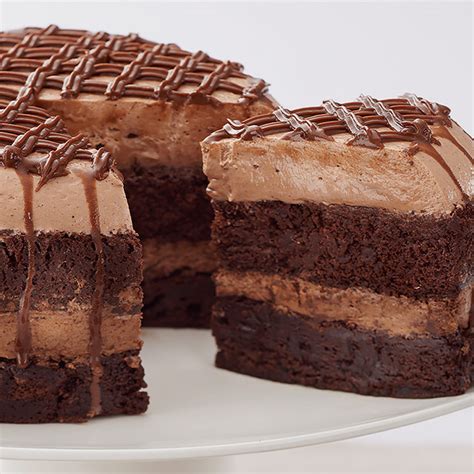 Chocolate mousse on chocolate butter cake, iced with whipped cream, drizzled with chocolate ganache and sprinkled with chocolate chips. These Are the 10 Best-Selling Contis Cakes and Dishes in ...