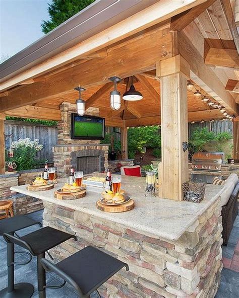 To become the neighborhood party house, you should also invest in a fire pit and hot tub, which are both great outdoor ideas for those cooler nights. Awesome Yard and Outdoor Kitchen Design Ideas 47 - Hoommy.com