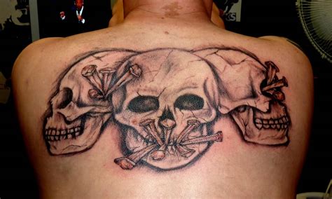 Evil skeleton with hat tattoo. Good Vs Evil Skull Tattoo Designs