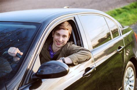 Happy Man In His New Black Car Smiles Stock Photo Image Of Transport