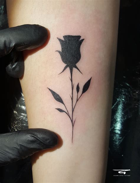 A black rose tattoo is thought to represent death, and while that may seem a little morbid to some, it can represent the death of a for instance, small and simple rose tattoos suit the hands, wrist, neck, and other areas. Small Rose Tattoo Blackwork Fineline | Black rose tattoos ...