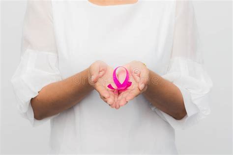 Pink Ribbon On Woman Hand To Support Breast Cancer Cause Stock Image Image Of Badge