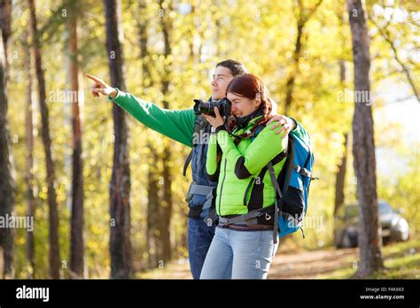 Woman Photographer Takes Pictures Stock Photo Alamy