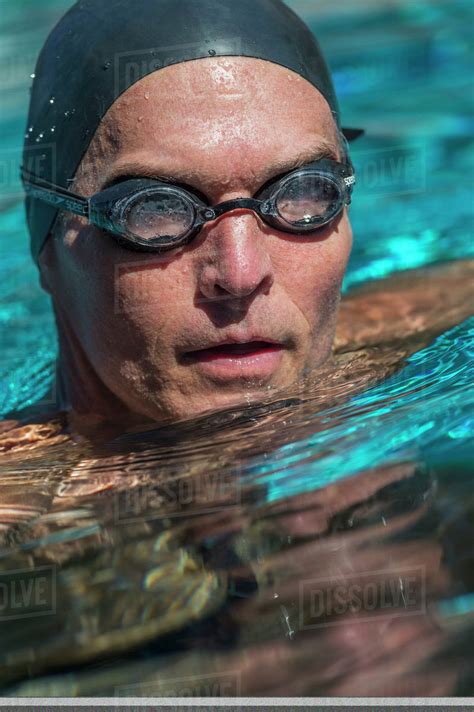 Portrait Of Swimmer Wearing Cap And Goggles Stock Photo Dissolve