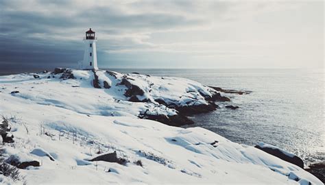 Lighthouse In Fresh Snow Stock Photo Download Image Now Istock