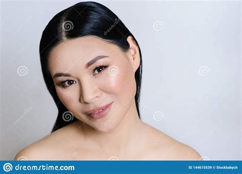 Beautiful Asian Woman Face With Clean Fresh Skin Nude Makeup