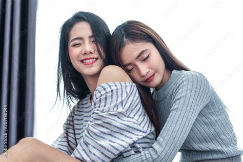 Two Asian Lesbian Women Hug And Embracing Together In Bedroom Couple People And Beauty Concept