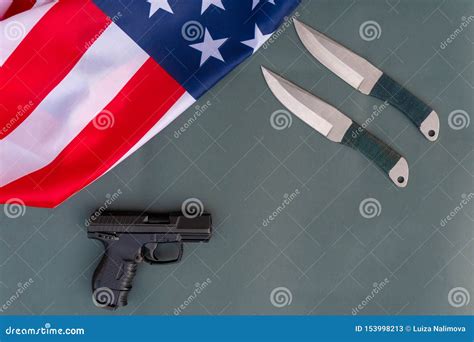 Throwing Knives Pistol American Flag Flat Lay On Gray Background