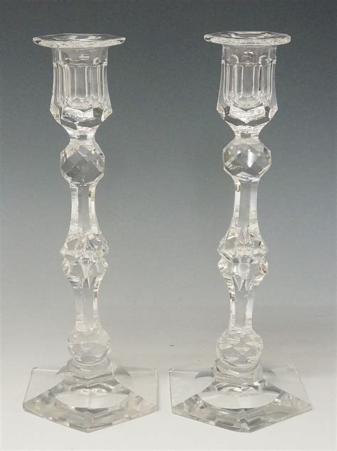 A Pair Of Tall Crystal Glass Candlesticks Each Facet Cut St