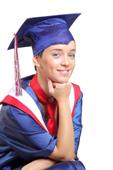 A Happy Graduating Student Wearing Cap And Gown Stock Photo Image Of