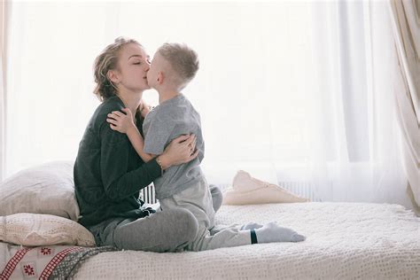 Pretty Beautiful Family Mother And Son In Bed In The Morning By Stocksy Contributor Andrei