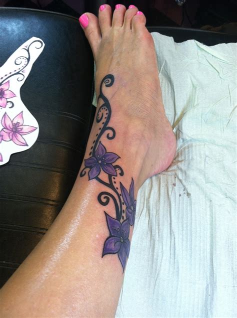 Click for more flower tattoos. Flower tattoo on ankle & foot | Tattoos | Pinterest