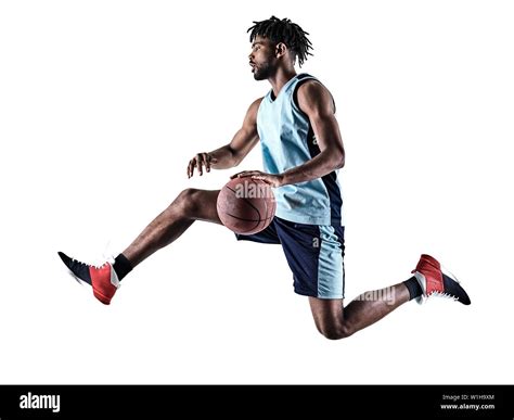 One Afro American African Basketball Player Man Isolated In Silhouette