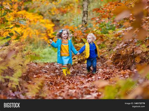 Happy Children Playing Image And Photo Free Trial Bigstock