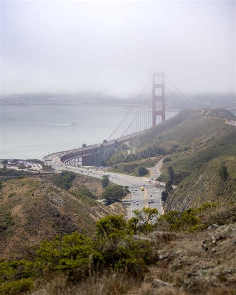 Us Highway 101 Crossing The Golden Gate Bridge With Haze And Fog In The