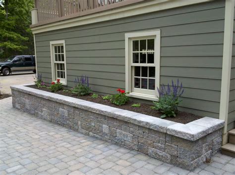These beds should match (or at least align with) the beds at the front of your house. Image result for raised flower bed made with stone ...