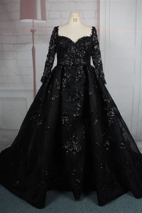 Black Plus Size Long Sleeve Ball Gown From Darius Cordell