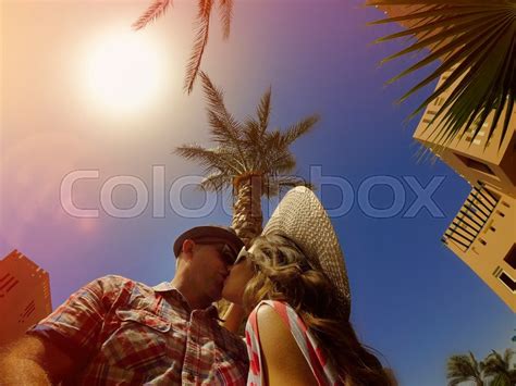 Young Couple In Love Kissing On A Palm Stock Image Colourbox