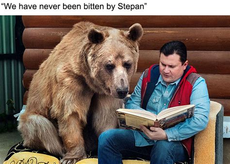 russian couple adopted an orphaned bear 23 years ago and they still live together
