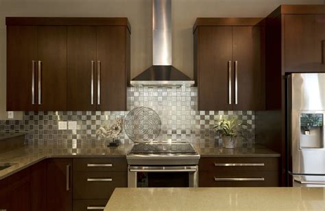 The color changes based on the surrounding area. IKEA Stainless Steel Backsplash: The Point Pluses - HomesFeed