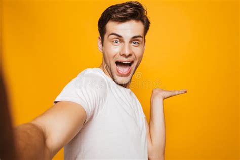 Portrait Of A Happy Young Man Taking A Selfie Stock Photo Image Of