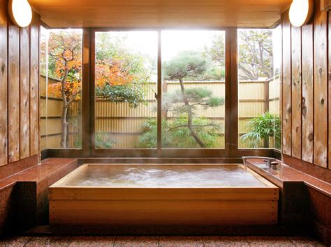 A bathroom tub needs to be separated from a toilet area and a bathroom sink. Japanese Bathroom - WASOU