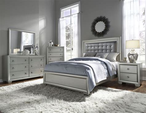 We are bringing in new product every week and only have about half of our inventory photographed, so coming to browse in person is a great way to find the newest items. Celestial Upholstered Panel Bedroom Set from Samuel ...