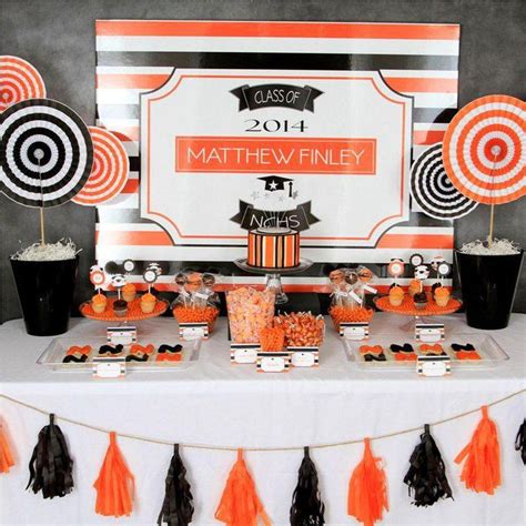 Stunning Orange And Black Pinwheel Centerpieces On Graduation Party