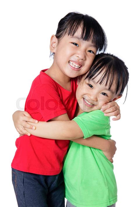 Asian Chinese Little Girls Hugging Each Other Stock Image Colourbox