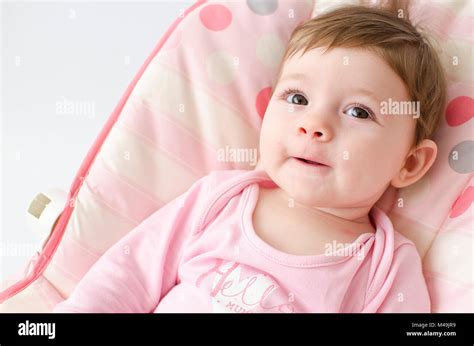 Baby Girl On A Bouncer Stock Photo Alamy