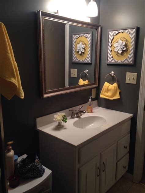 A lot can be done on how to decorate your bathroom and appear beautiful. Grey and yellow bathroom | Gray bathroom decor, Yellow ...