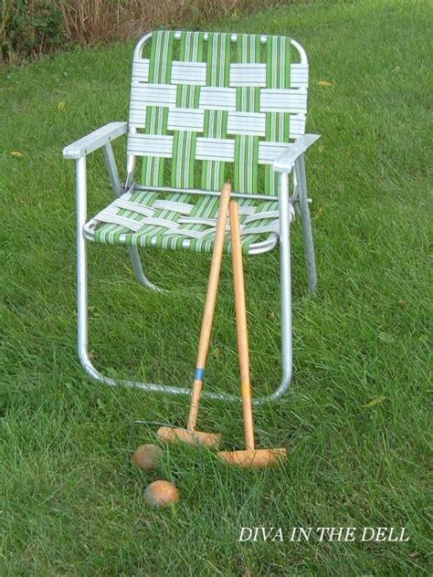 It has padded hard arms. Vintage Aluminum Lawn Chair with Blue Webbing by ...