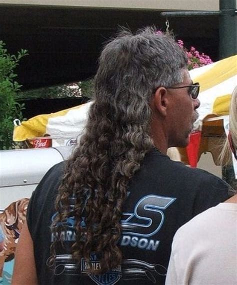 This side part haircut is a flattering and popular style that can have tapered (scissor cut) or taper faded (cut with clippers) sides. 45 Fascinating Mullet Haircut Ideas - OBSiGeN