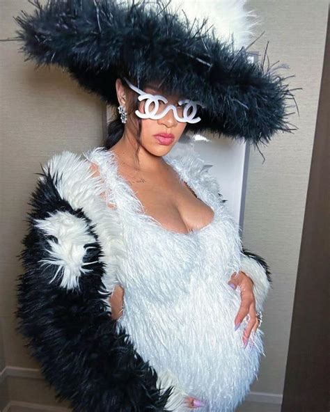Pregnant Rihanna Highlights Growing Baby Bump In Furry Mini Dress As