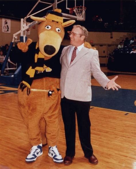 Zippy Standing Next To The University Of Akrons Legendary First Mascot