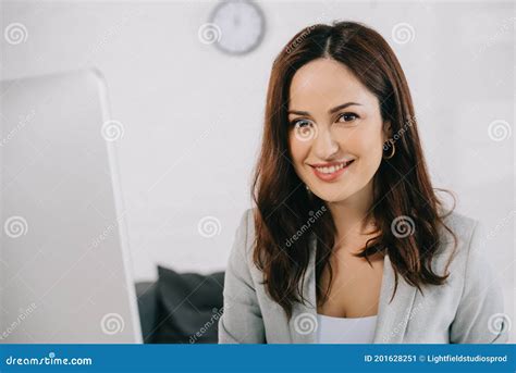 Happy Beautiful Secretary Looking At Camera Stock Image Image Of