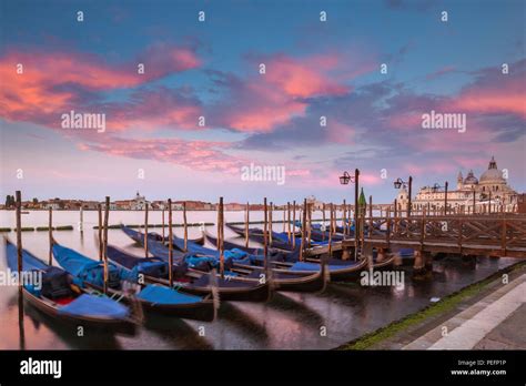 Gondolas Parkked At Sunset In Venice Italy Stock Photo Alamy