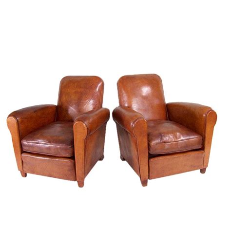 Chromed steel frame in upholstery. Pair of Small Deco Leather Club Chairs at 1stdibs