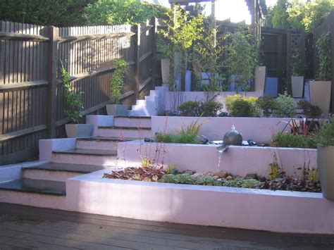 The smaller your space, the more important the choices you make. A Life Designing: Sloping Garden Design Challenges