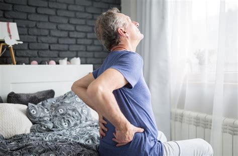 Waking up with lower back pain: Causes and treatment