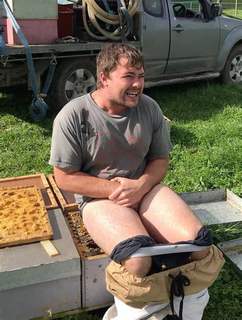Hilarious Moment Idiot Beekeeper Plants His Naked Bum Onto A BEE HIVE