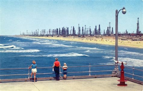 Oil Derricks Crowd Huntington Beach California Circa 1960s