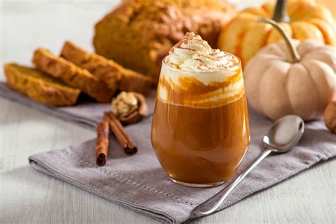 Pumpkin Spice Latte Hot Coffee Drink With Pumpkins And Pumpkin Cake