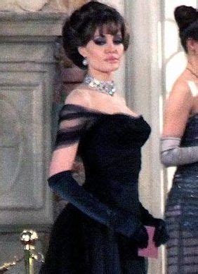 Angelina jolie always awes in her films, but in the tourist she has the aid of some incredible accessories to paired with a simple black dress or suit, these are a standout. Jolie in a simple black evening gown in the Tourist ...